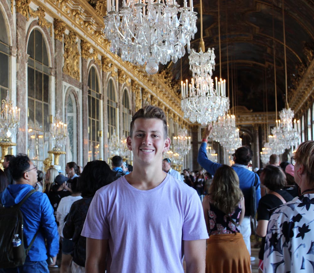 <p>Zach Wishart, soon-to-graduate history and social studies education major, poses for a photo at the Palace of Versailles, in Versailles, France. Wishart will be traveling to Tay Ninh, Vietnam, for a Fulbright Assistantship teaching English to students in the city. <strong>Zach Wishart, Photo Provided</strong></p>