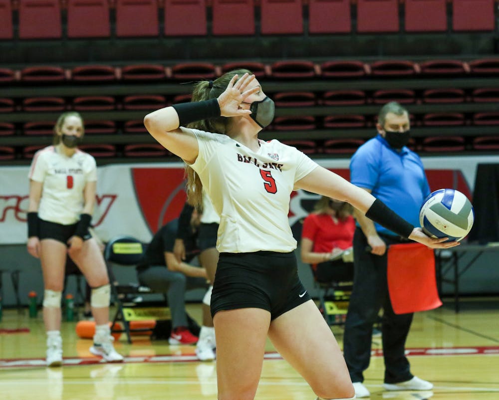 Sophomore middle blocker Marie Plitt serves the ball. The Cardinals later lost to the Chippewas 3-1. Gabi Kramer, DN