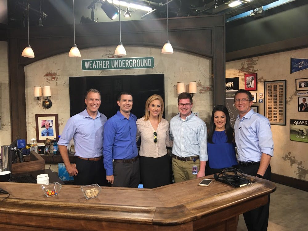 <p>Nathan DeYoung (fourth from left) with the Weather Underground on-air team. <em>Photo Provided</em></p>