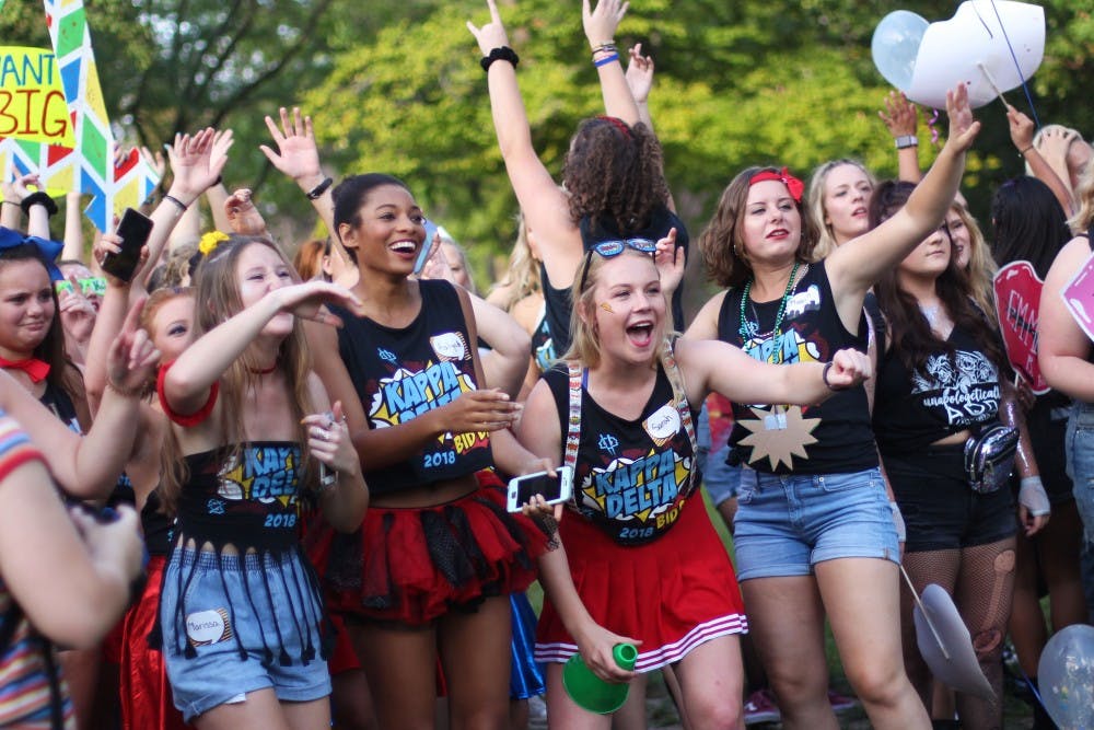 <p>Members of Kappa Delta cheer while waiting on the new members of the sorority to join them on September 16, 2018, at the Quad. <strong>Demi Lawrence,DN</strong></p>