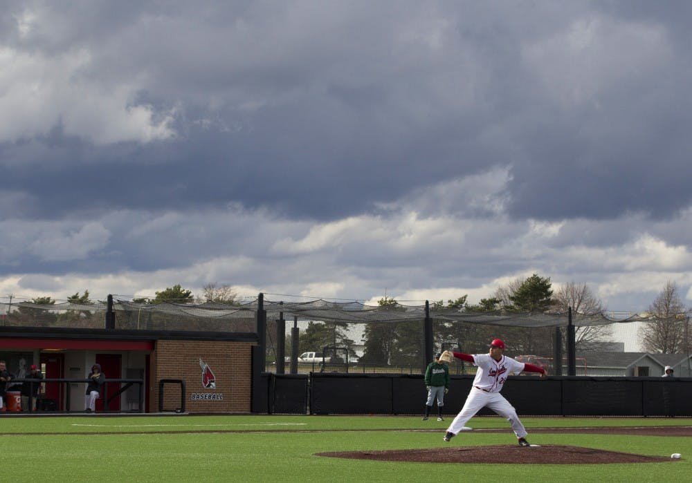 The Ball State baseball team played under stormy skies on April 1 in the game against Ohio. DN PHOTO GRACE RAMEY