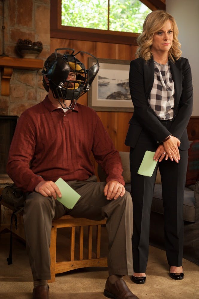 PARKS AND RECREATION -- "Ron and Jammy" Episode 702 -- Pictured: (l-r) Nick  Offerman as Ron Swanson, Amy Poehler as Leslie Knope -- (Photo by: Colleen Hayes/NBC)