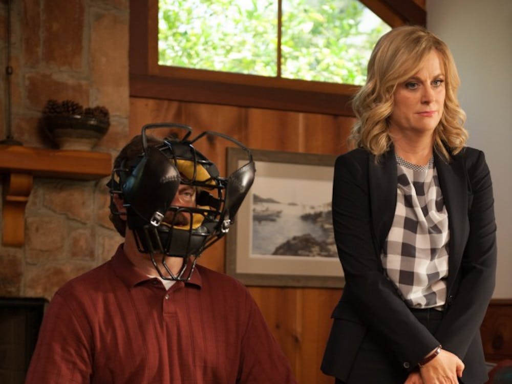 PARKS AND RECREATION -- "Ron and Jammy" Episode 702 -- Pictured: (l-r) Nick  Offerman as Ron Swanson, Amy Poehler as Leslie Knope -- (Photo by: Colleen Hayes/NBC)