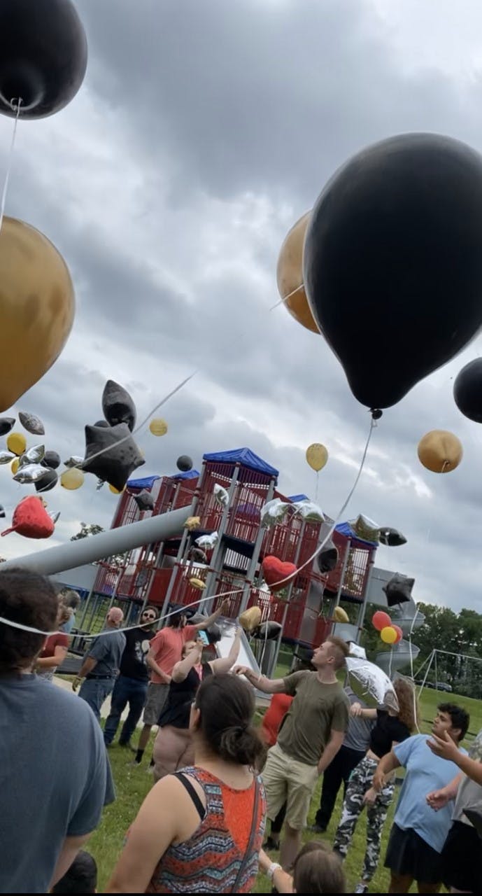 Friends and family members release balloons in Montana Lopez&#x27;s honor in Muncie, June 23, 2021. After Lopez was shot and killed June 19, family members organized a balloon release, funeral and candle lighting. Blake Smith, Photo Provided