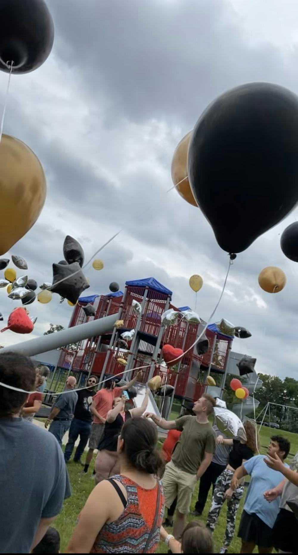 <p>Friends and family members release balloons in Montana Lopez&#x27;s honor in Muncie, June 23, 2021. After Lopez was shot and killed June 19, family members organized a balloon release, funeral and candle lighting. <strong>Blake Smith, Photo Provided</strong></p>