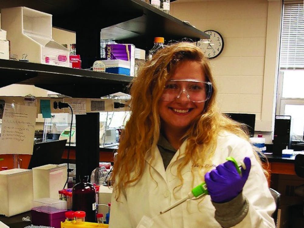 Senior Alex Quillin researches the mitoNEET protein in one of Ball State’s labs in spring 2018. &nbsp;The mitoNEET protein regulates energy metabolism. Barb Stedman, Photo Provided.&nbsp;