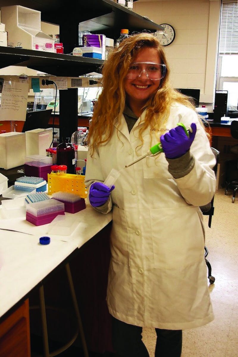 Senior Alex Quillin researches the mitoNEET protein in one of Ball State’s labs in spring 2018. &nbsp;The mitoNEET protein regulates energy metabolism. Barb Stedman, Photo Provided.&nbsp;