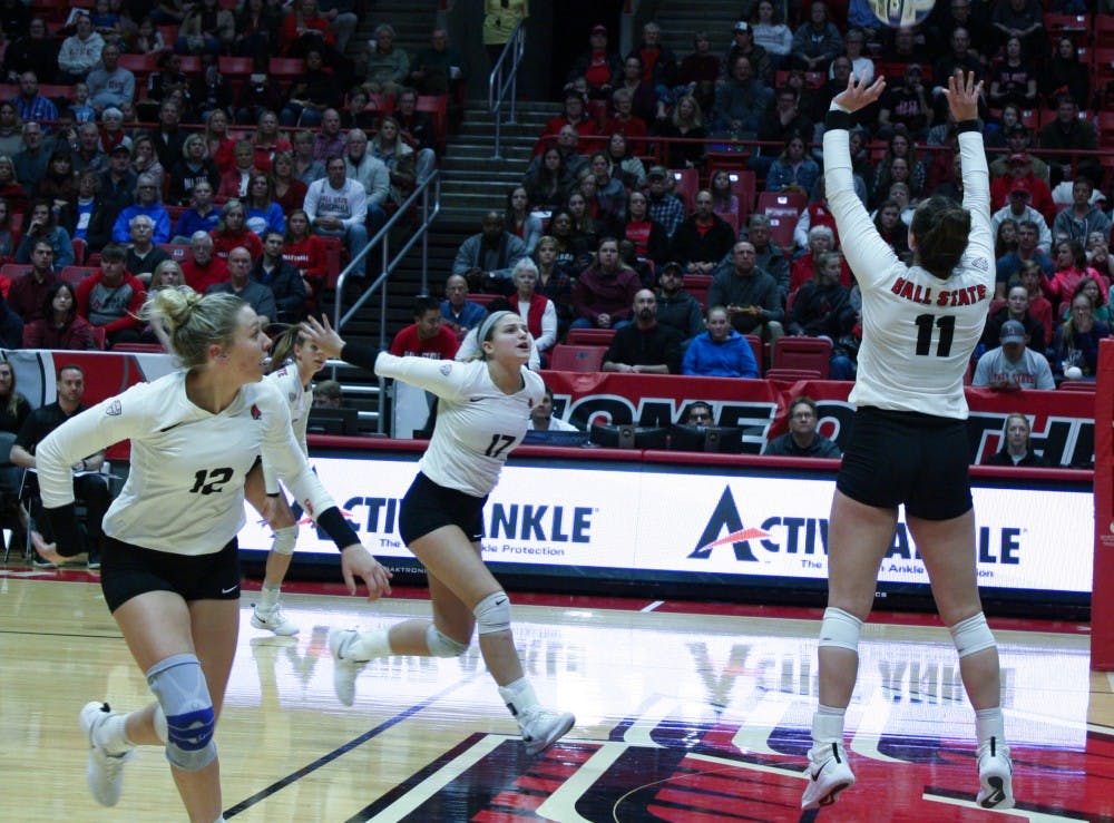 <p>Senior setter Amber Seaman sets the ball for her teammates at the Ball State Women's Volleyball game against Akron Nov. 10, 2018, at John E. Worthen Arena. The Cardinals ended the regular season with a record of 21-8. <strong>Tailiyah Johnson, DN</strong></p>