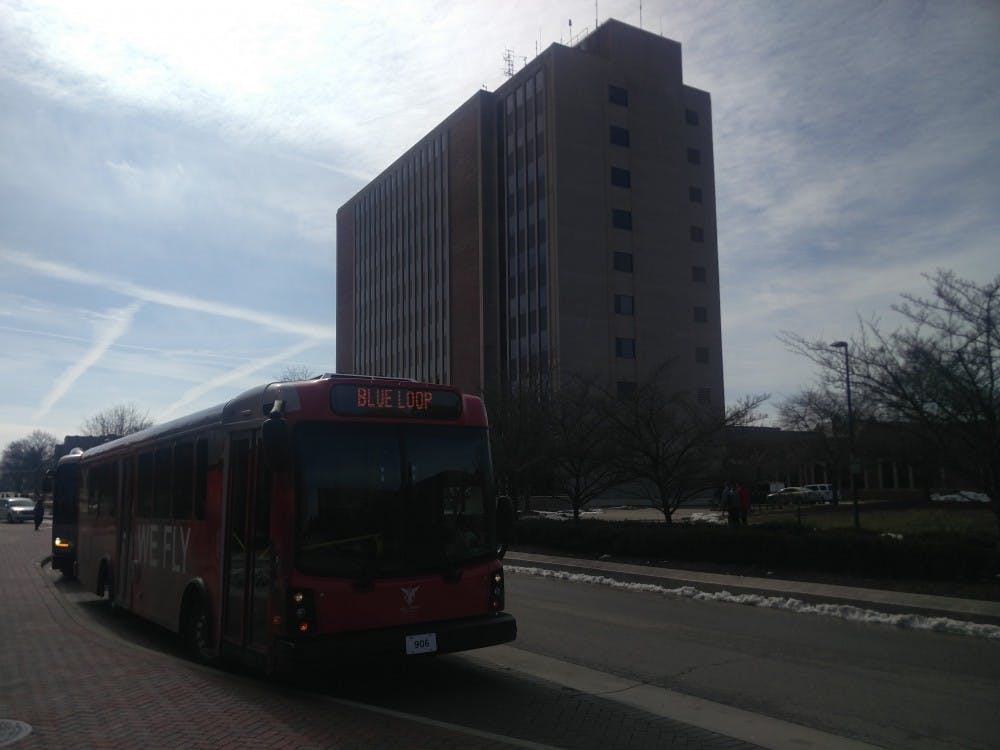 A blue loop bus stops for students at a bus stop Feb. 21, 2019, next to Hargreaves Music building on McKinley Avenue. Transportation Services performed a trial run of having an additional blue loop bus for three hours in the morning. Rohith Rao, DN