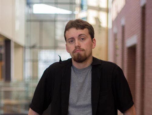 Sophomore telecommunication sales major Skyler Bevins poses for a photo Jan. 11, 2013 in the David Letterman Communication and Media Building. Bevins enjoys photographing lost gloves and putting the photos on the Internet. DN PHOTO TAYLOR IRBY