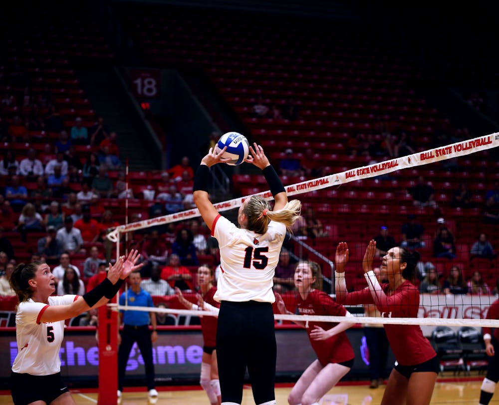 Junior setter Megan Wielonski sets the ball against The University of Oklahoma Aug. 26 at Worthen Arena. Wielonski scored seven points during the game. Mya Cataline, DN
