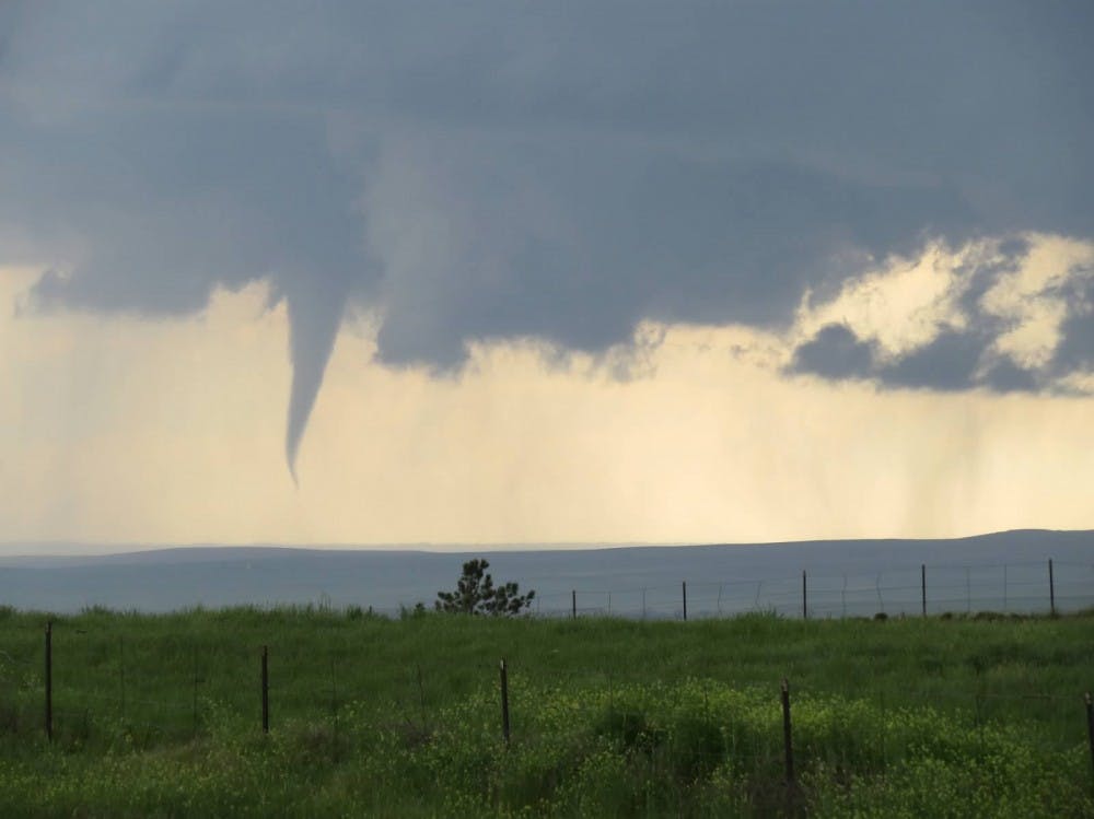<p>Ball State immersive learning course students spent the summer studying tornadoes. The students saw six tornadoes during on a cross-country trip. PHOTO PROVIDED BY DAVID CALL </p>