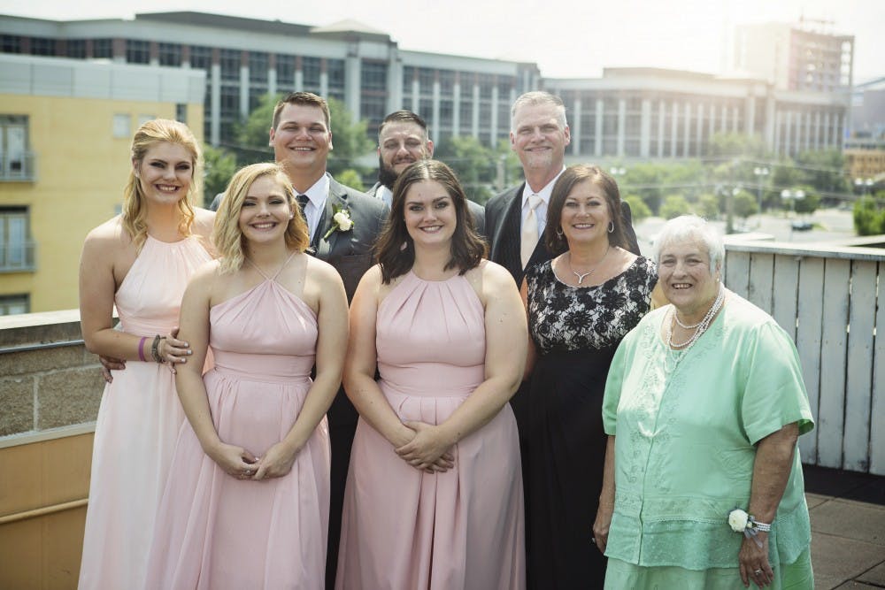 Nulph and her family celebrate her older brother's wedding June, 2018 in Indianapolis.