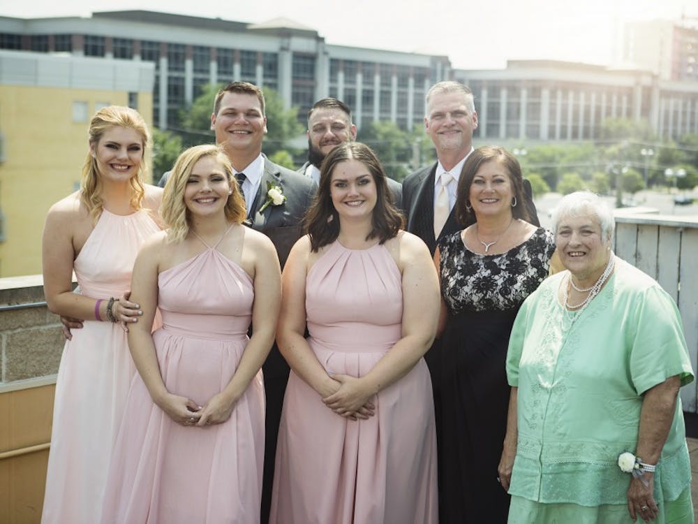 Nulph and her family celebrate her older brother's wedding June, 2018 in Indianapolis.
