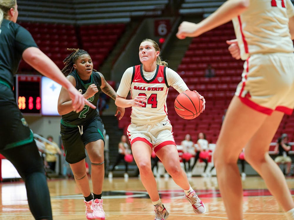 Sophomore Guard Madelyn Bischoff driving to the paint in a game against Ohio Feb. 15 at Worthen Arena. Bischoff finished with 14 points in the game. Brayden Goins, DN