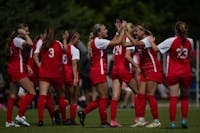 The BSU girl's soccer team celebrates after scoring a goal against Queens on Sep 8 at Briner Sport Complex. Kaelyn Vallaeu scored this goal during the 81st minute of the game. Titus Slaughter, DN