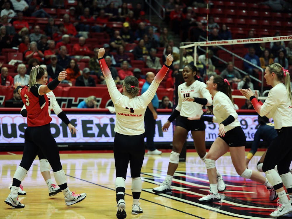 Ball State women's volleyball celebrate scoring a point against Toledo Oct. 17 at Worthen Arena. The Cardinals won 3-0 against the Rockets. Mya Cataline, DN