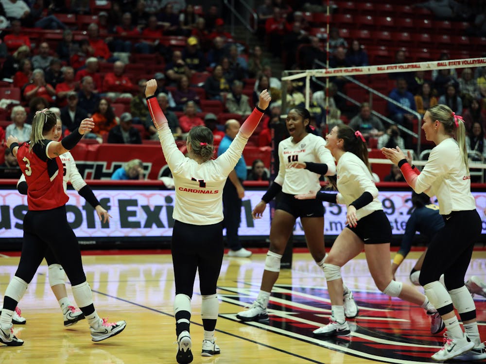 Ball State women's volleyball celebrate scoring a point against Toledo Oct. 17 at Worthen Arena. The Cardinals won 3-0 against the Rockets. Mya Cataline, DN