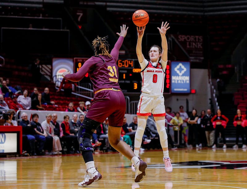 Junior Ally Becki takes a 3-pointer against Central Michigan Feb. 21 at Worthen Arena. Ball State led Central Michigan 46-21 at half. Andrew Berger, DN 