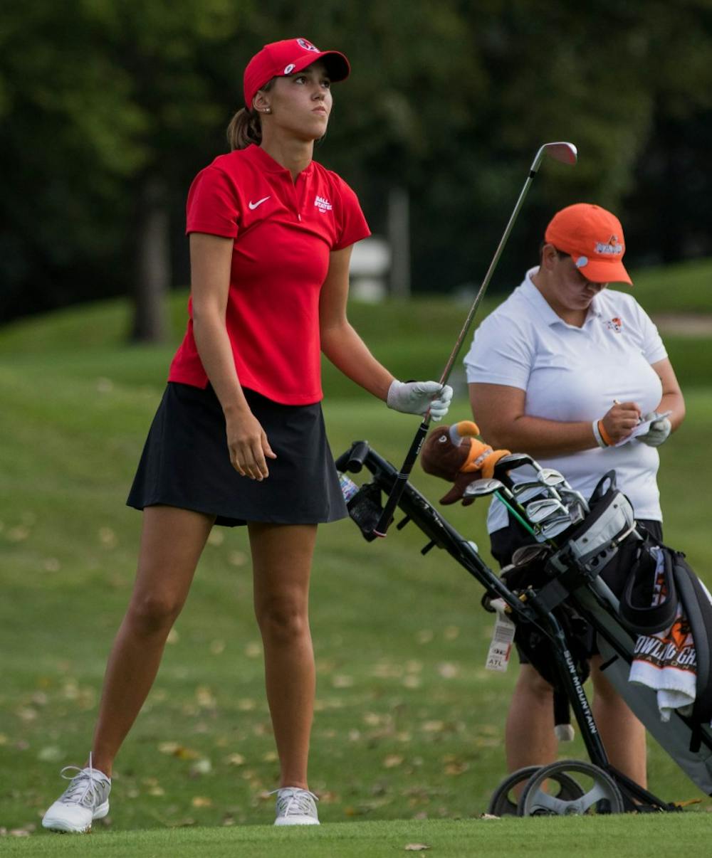Freshman Hadley Moritz follows her ball to see where it will land Sept. 17, 2018, at the Players Club in Yorktown, Indiana during the Cardinal Classic Golf Tournament. The Cardinal Classics is a two-day golfing event with 36 holes played on the first day and 16 holes on the second. Eric Pritchett,DN