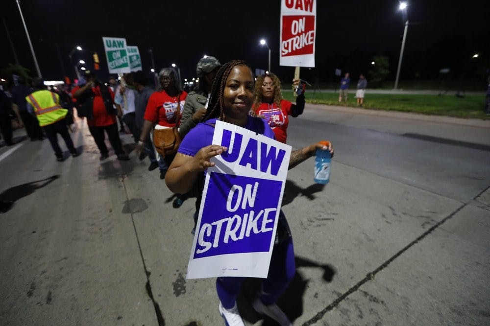 <p>United Auto Workers members picket outside the General Motors Detroit-Hamtramck assembly plant in Hamtramck, Mich., early Monday, Sept. 16, 2019. Roughly 49,000 workers at General Motors plants in the U.S. planned to strike just before midnight Sunday, but talks between the UAW and the automaker will resume. <strong>(AP Photo/Paul Sancya)</strong></p>