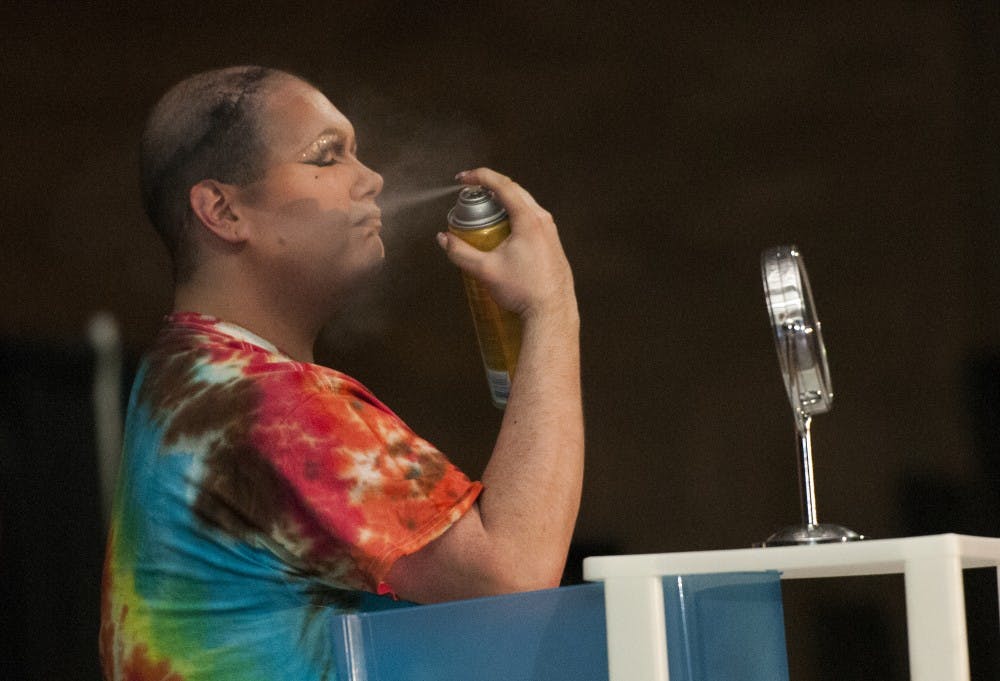 Avery Leigh removes her makeup during her final number at Spectrum's Bad to the Bone drag show April 12. This was the last drag show Jaime Whitaker, who performs at Avery Leigh, did as a Ball State student. DN PHOTO JONATHAN MIKSANEK