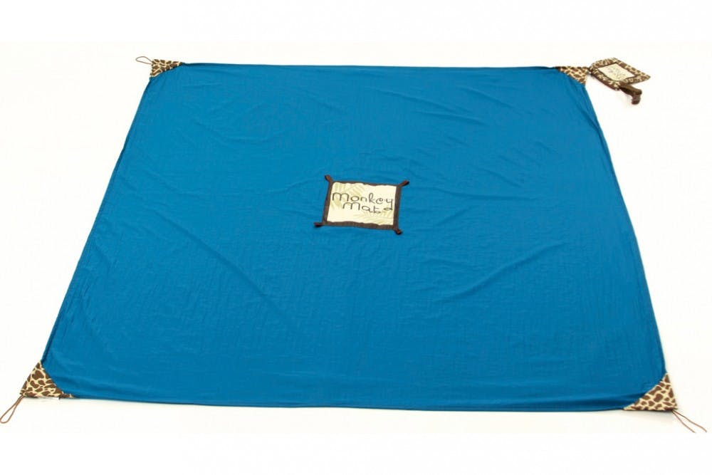 	<p>Alumna Courtney Turich and Christie Barany, her business partner, created the Monkey Mat. It is a compact blanket used as a portable sitting surface at places like airports, soccer games and outdoor activities. <span class="caps">PHOTO</span> <span class="caps">COURTESY</span> OF <span class="caps">MONKEY</span> <span class="caps">MAT</span></p>