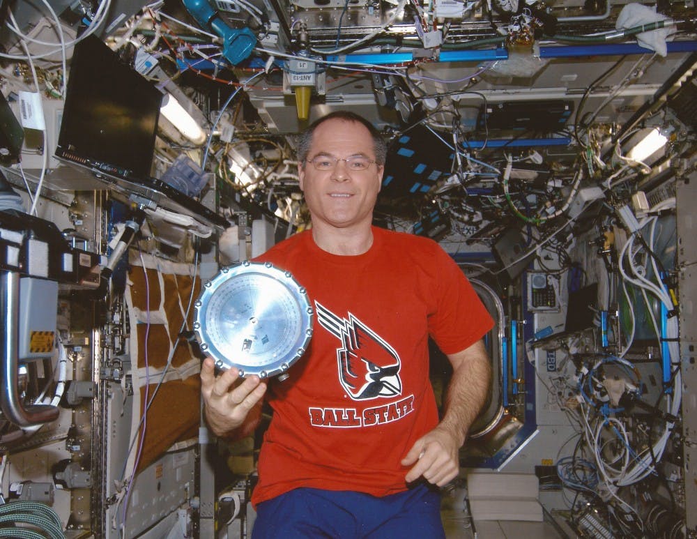 Kevin Ford wears a Ball State shirt while on the International Space Station. His sister, Nancy Richardson, works at Ball State as an administration coordinator for educational leadership. PHOTO PROVIDED BY SCOTT TRAPPE