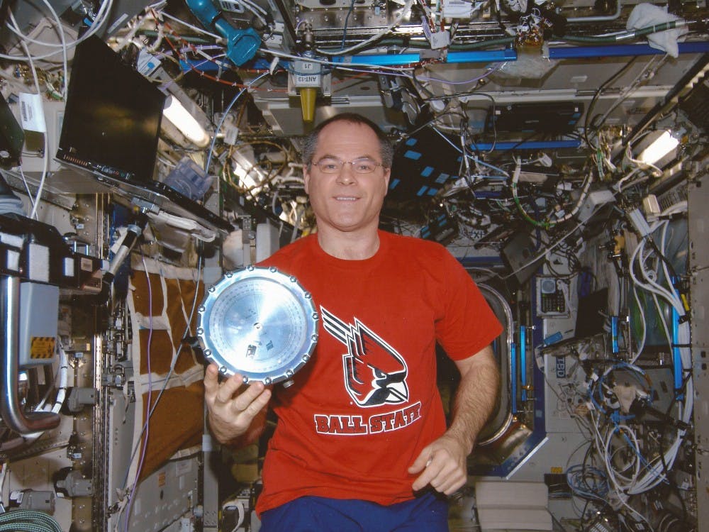 Kevin Ford wears a Ball State shirt while on the International Space Station. His sister, Nancy Richardson, works at Ball State as an administration coordinator for educational leadership. PHOTO PROVIDED BY SCOTT TRAPPE
