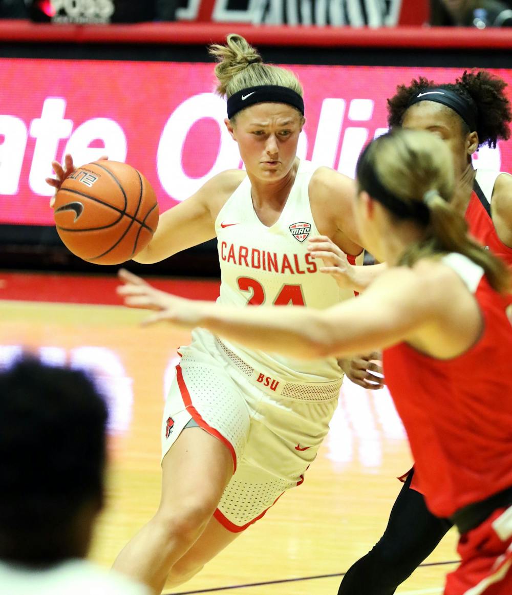 <p>Ball State graduate guard Jasmin Samz drives the ball in during the Cardinals' game against Western Kentucky Dec. 7, 2019, at John E. Worthen Arena. Samz scored 13 points. <strong>Paige Grider, DN</strong></p>