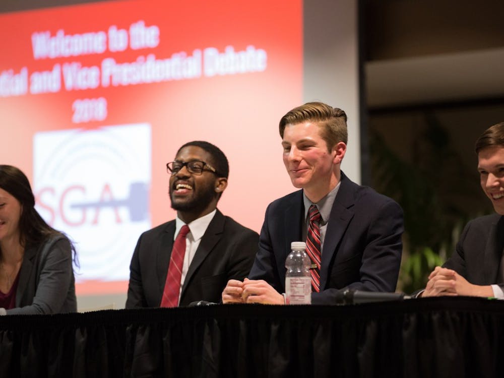 Kyleigh Snavely, secretary, Jalen Jones, treasurer, Matt Hinkleman, vice president, and Isacca Mitchell, president of Amplify during the 2018 All Slate debate hosted by the Student Government Association at L.A. Pittenger Student Center on Feb 18. Eric Pritchett, DN