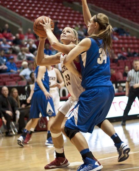 Junior forward Katie Murphy attempts the lay up against IPFW during their game Nov. 19 at Worthen Arena. Ball State will take on Detroit Mercy at 7 p.m. Dec. 6 at home. DN FILE PHOTO JONATHAN MIKSANEK