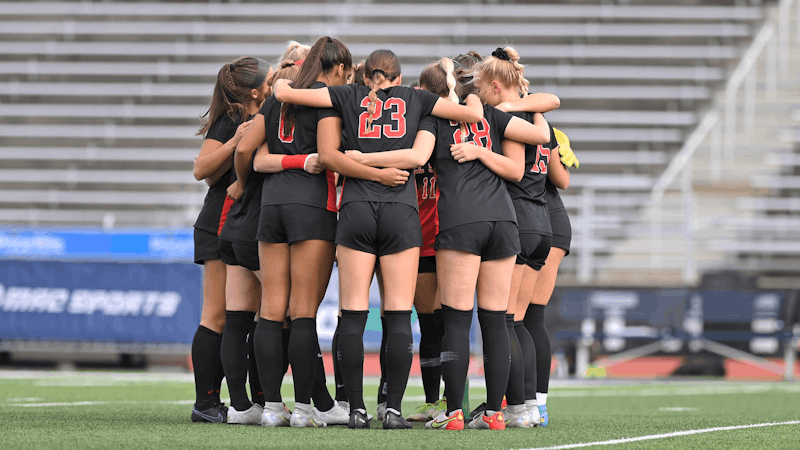 Ball State soccer huddles together before the Mid-American Conference (MAC) Championship game against Buffalo. The Cardinals fell 2-0 in their third MAC championship appearance. Joe Gilbert/Ball State Athletics photo courtesy 