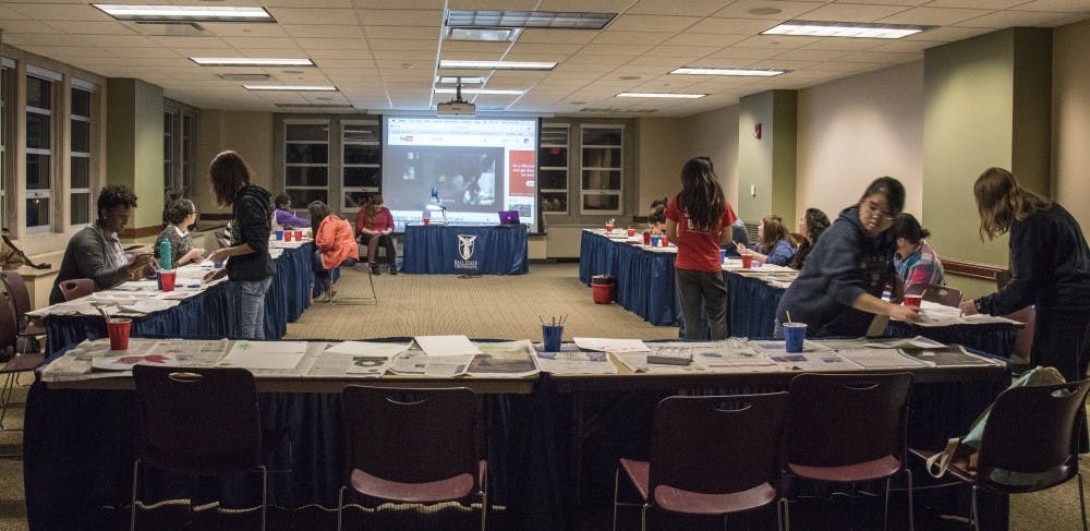 Ball State students paint water color pictures during the Asian American Student Association's month of events. Water Painting was the first event of the month. DN PHOTO RACHEL BRAMMER