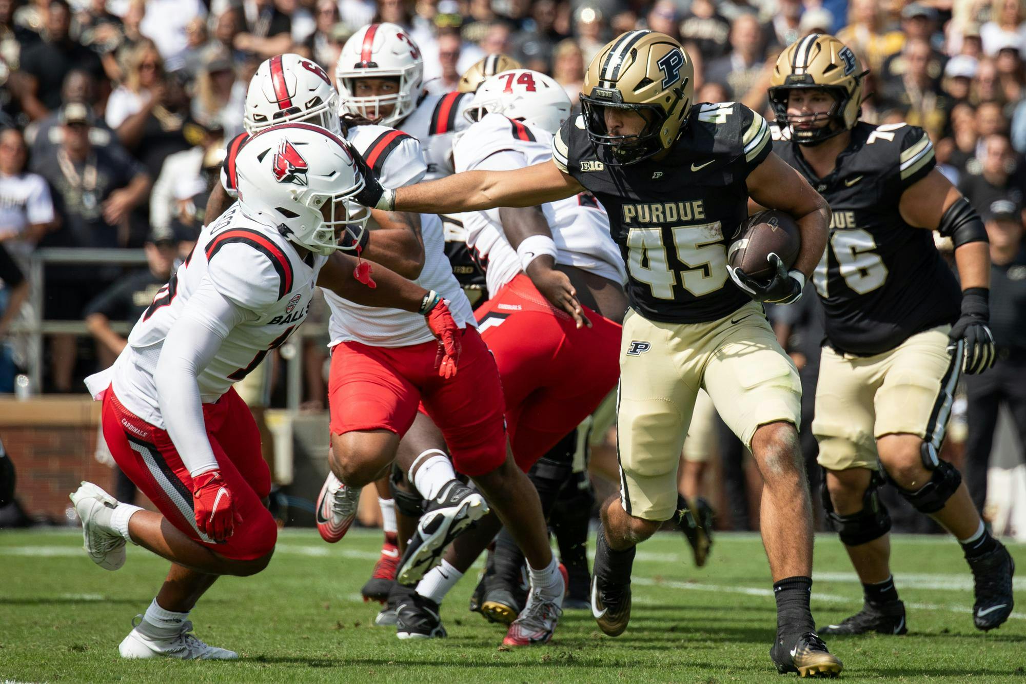 Purdue senior running back Devin Mockobee runs the ball against Ball State Aug. 30 at Ross-Ade Stadium. Purdue defeated Ball State 31-0. Andrew Berger, DN 
