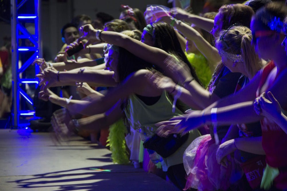 Dance Marathon participants dance near the stage during the last two hours of the event. DN PHOTO EMMA ROGERS