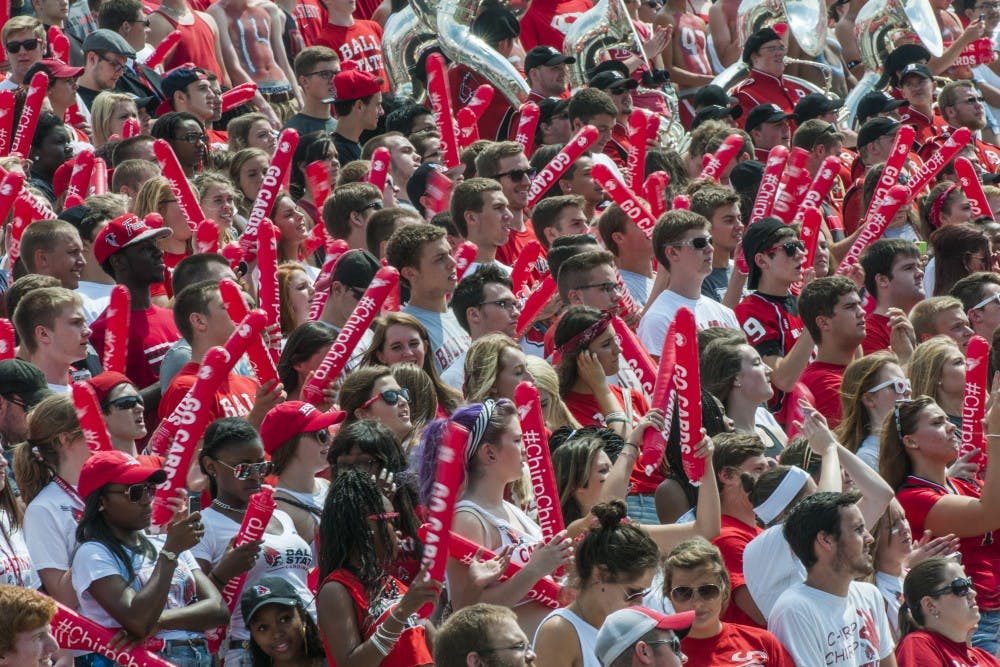 Fans cheer in the stands during the game against Colgate on Aug. 30 at Scheumann Stadium. DN PHOTO JONATHAN MIKSANEK