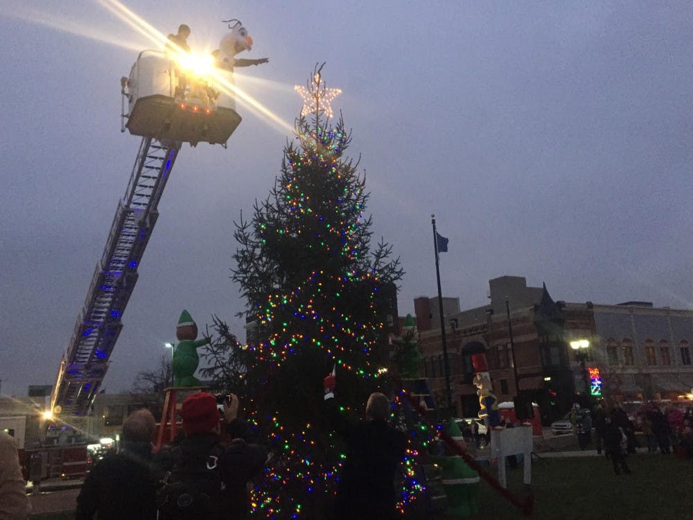 <p>Muncie's annual Light Up DWNTWN will be a part of the city's First Thursday art gallery opening on Dec. 1. The event will expand the regular art gallery shows to restaurants and stores to promote holiday shopping. <em>Casey Smith // DN File</em></p>