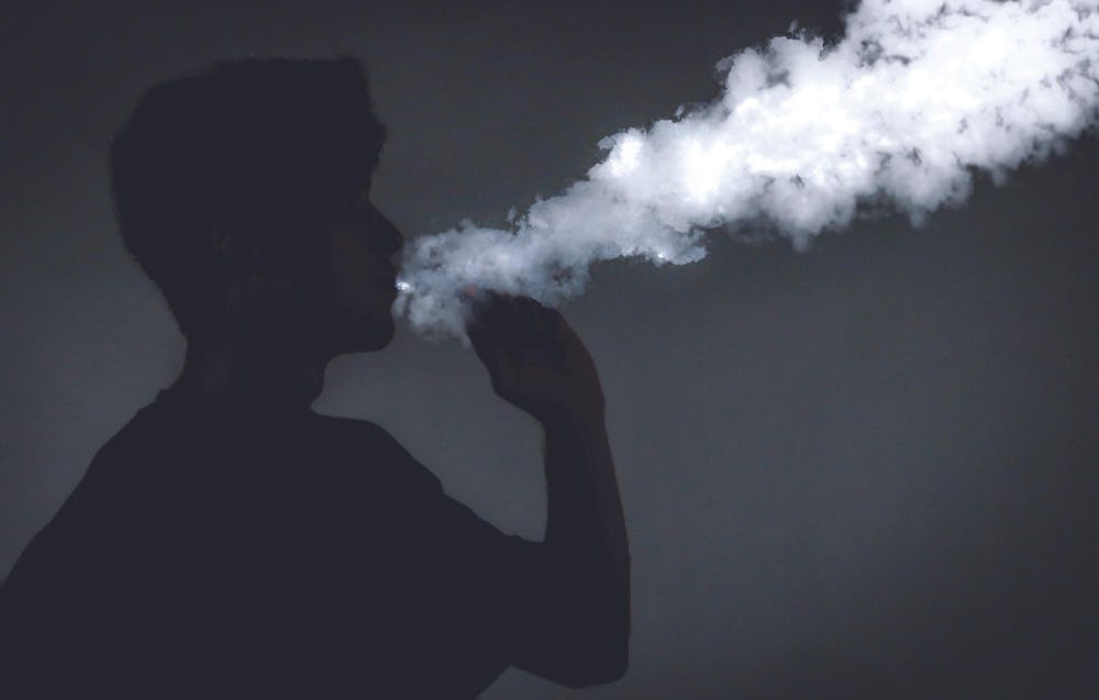 An anonymous subject poses for a photo Sept. 10 in the Arts and Journalism Building. More than 1 in 10 Indiana high school students are using a tobacco product, including vaping. Jessica Bergfors, DN
