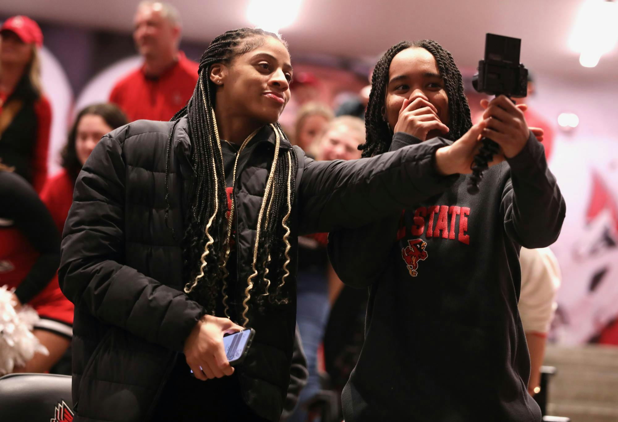 Ball State basketball players celebrate March 16 after watching the Selection Show at Scheuman Stadium. This is the first time the Cardinals have made the NCAA Tournament since 2009. Zach Carter, DN. 
