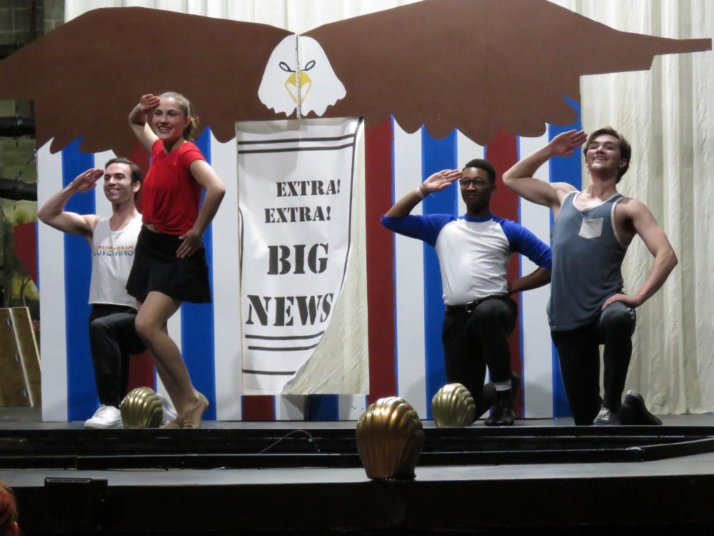 <p>Junior musical theatre majors Lily Wessel (front left) and Micheal Hassel (front right) perform during a dress rehearsal of the musical "Gypsy" March 14, 2019, in University Theatre. Weseek and Hassel, June and Tulsa, are love interests in the musical who run off to get married. Molly O'Connor, DN.&nbsp;</p>