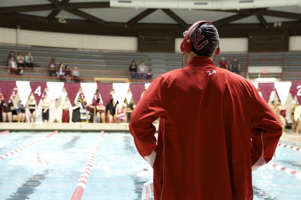 Freshman Thomas Cross prepares to swim in his event&nbsp;during the swim and dive meet against IUPUI and the University of Milwaukee on Jan. 23 at Lewellen Pool. DN PHOTO ALAINA JAYE HALSEY