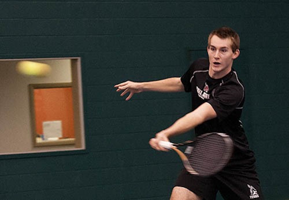 MTennis - Sophomore Ray Leonard returns a volley during his singles match against Detroit Mercy. Leonard sat out the last two matches against Brown and IUPUI. DN FILE PHOTO BOBBY ELLIS