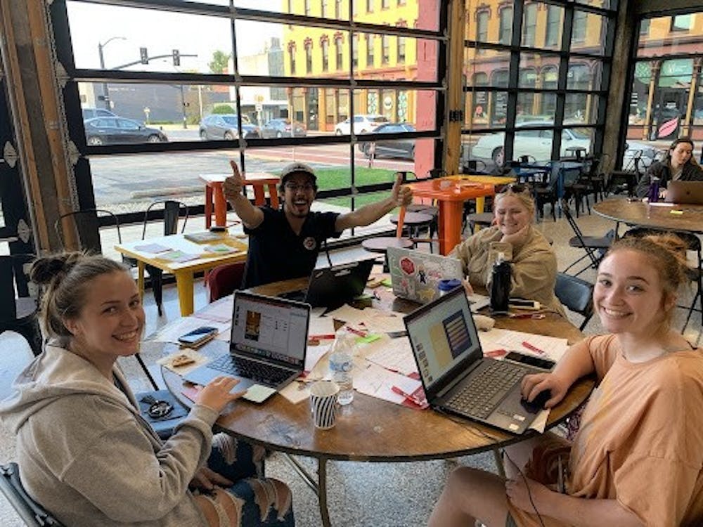 Ball State students Jordyn Gasser, Brenna Callahan, Sophia Chaillé and Kevin Zabala work on their startup business at Startup Weekend Oct. 8, 2021. Groups were typically four to six people. Richard Kann, DN