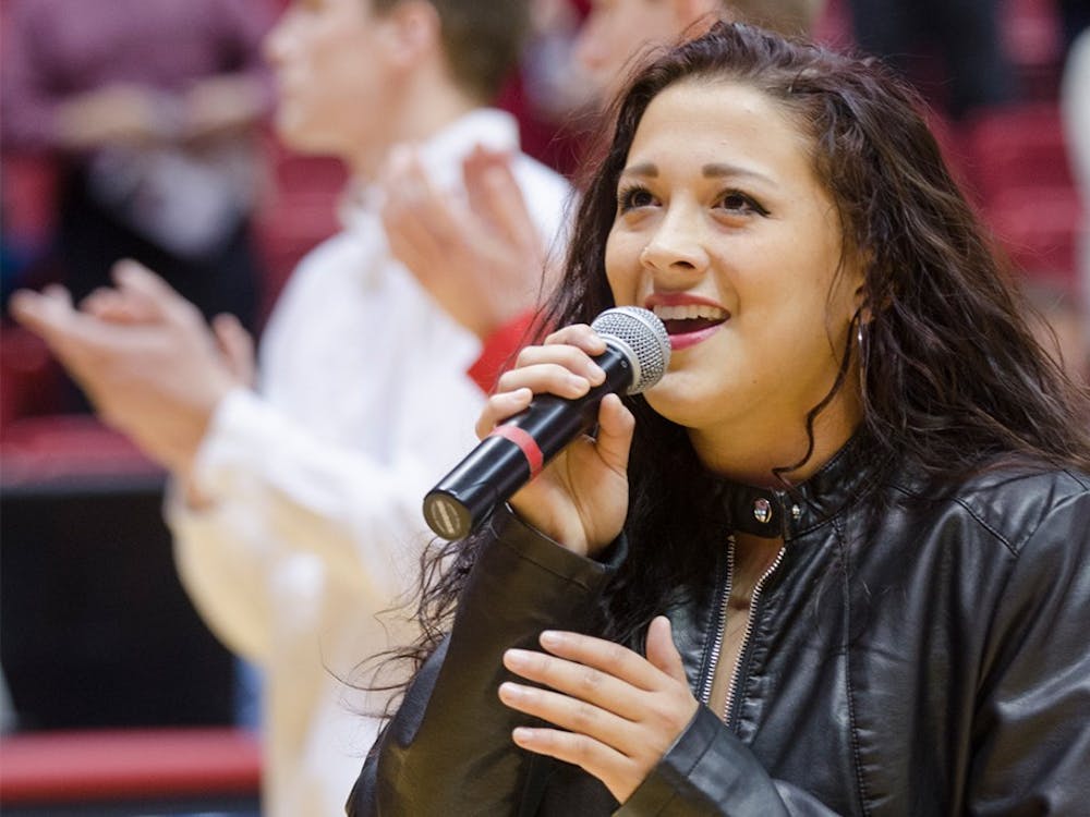 Sophomore Lauren Hall sings the Star-Spangled Banner before the men's basketball game November 2014 at Worthen Arena. After Ball State, Hall moved out west to California to pursue her passion for music. Breanna Daugherty, DN File&nbsp;
