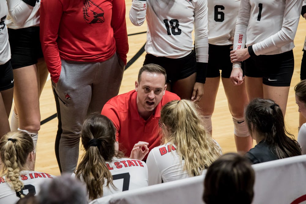 <p>Ball State volleyball assistant coach Fritz Rosenberg talks with the team during a time out in their game against Central Michigan Nov. 17, 2019, in John E. Worthen Arena. Rosenberg is a Ball State alumnus who has been the assistant coach for six seasons. <strong>Eric Pritchett, DN</strong></p>