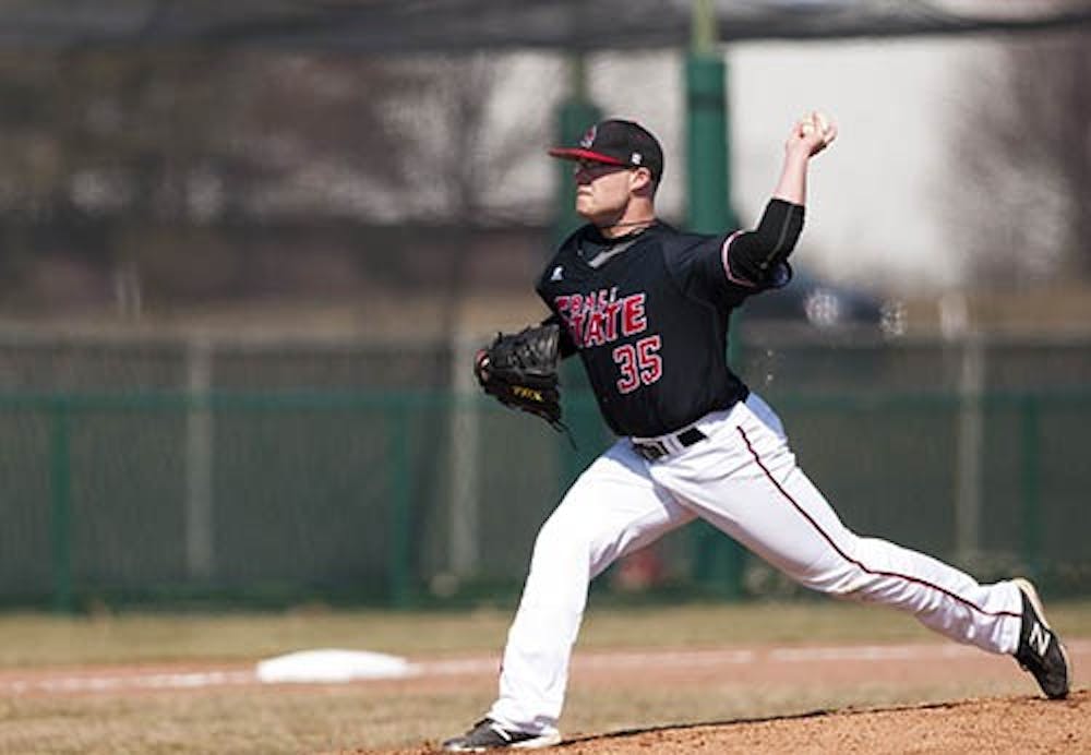 Senior Jon Cisna throws a pitch during the second game against Akron on March 23. The Cardinals will face off against Bowling Green at 3 p.m. today. DN FILE PHOTO JONATHAN MIKSANEK