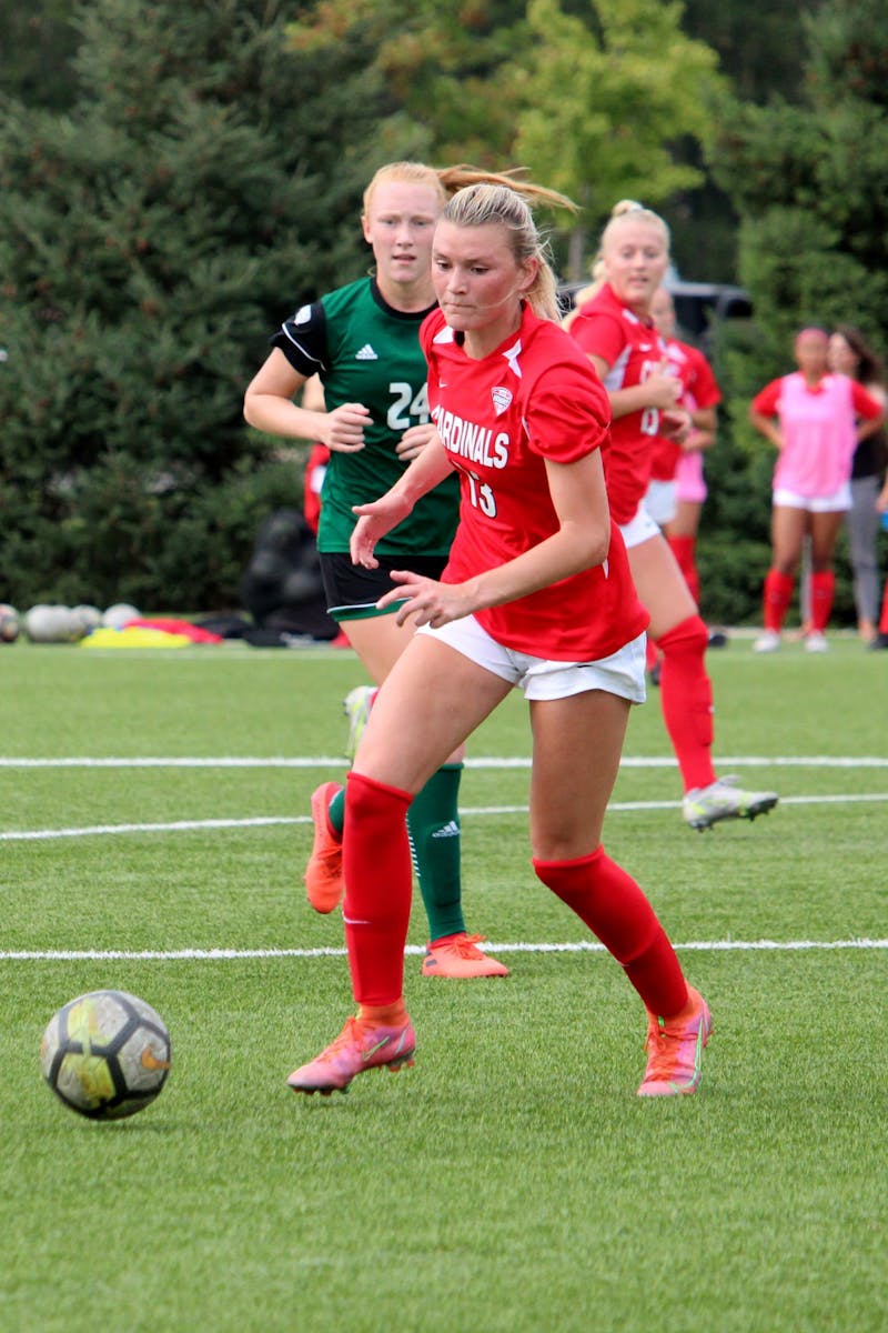 Senior defender Kennedy Metzger goes for the ball against Ohio on Oct. 14, 2021, at Briner Sports Complex in Muncie, IN. Amber Pietz, DN