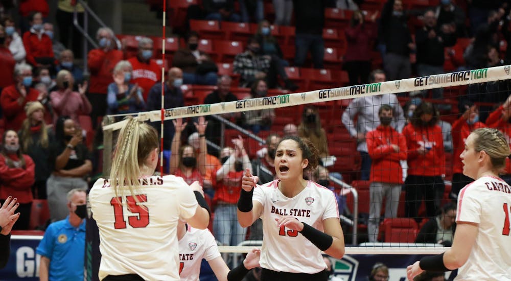 Ball State junior Natalie Mitchem celebrates after a kill in during their match against Western Michigan on Nov. 22 at Worthern Arena. Ball State won against Western Michigan 3-1, securing  their position in the Mid-American Conference Women's Volleyball finals. Eli Houser, DN
