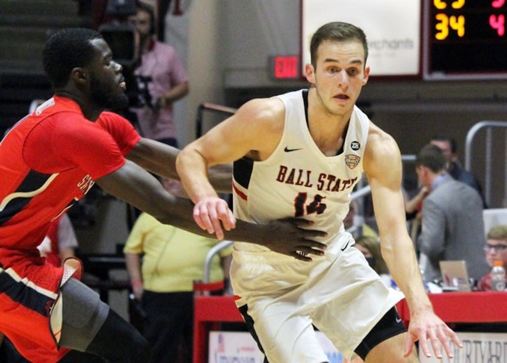 <p>&nbsp;Sophomore forward Kyle Mallers gets fouled by Stony Brook’s Junior Saintel as he brings the ball down the court during Ball State’s game against the Seawolves on Nov. 17 in John E. Worthen Arena. Mallers got 26 minutes of playing time. Paige Grider, DN&nbsp;</p>